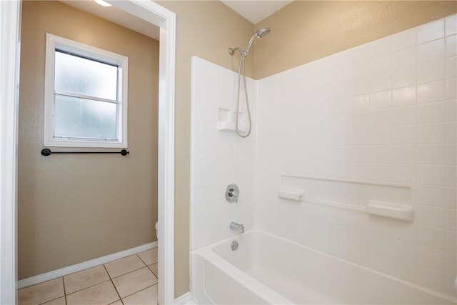 bathroom featuring tile patterned flooring, toilet, and shower / bathing tub combination