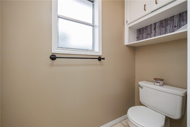 bathroom featuring toilet