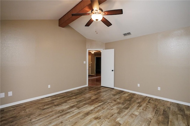 empty room with lofted ceiling with beams, ceiling fan, and hardwood / wood-style floors