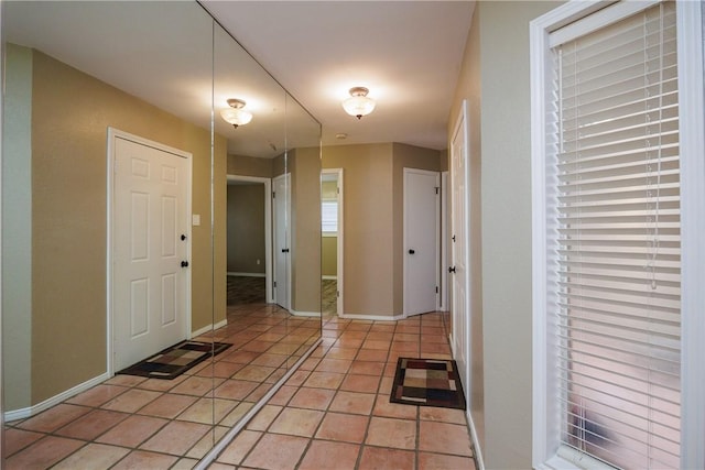 interior space with light tile patterned floors