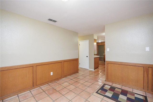 view of tiled spare room