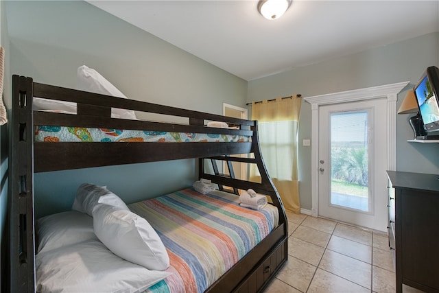 bedroom featuring light tile patterned floors