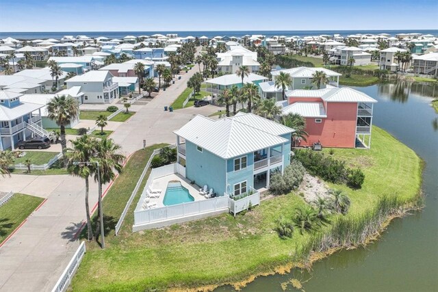 bird's eye view with a water view