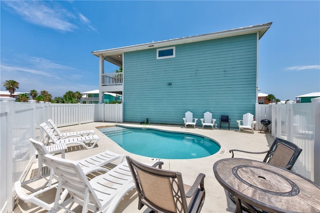 view of pool with a patio