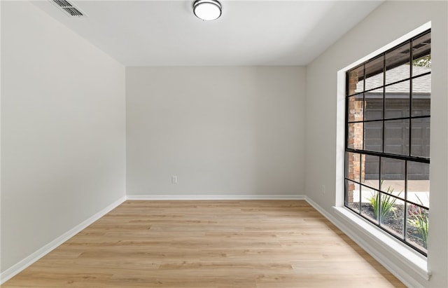 4530 Megal Dr, Corpus Christi, TX 78413 - spare room with plenty of natural light, light wood-style floors, and baseboards