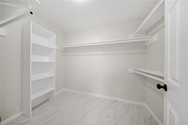 4530 Megal Dr, Corpus Christi, TX 78413 - walk in closet with light marble finish flooring