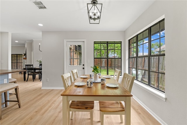 4530 Megal Dr, Corpus Christi, TX 78413 - dining room with baseboards, light wood-type flooring, and recessed lighting