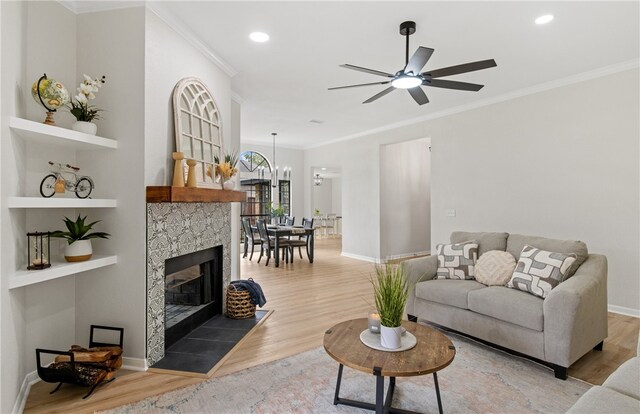 4530 Megal Dr, Corpus Christi, TX 78413 - living room featuring ornamental molding, light wood-style flooring, ceiling fan, baseboards, and recessed lighting