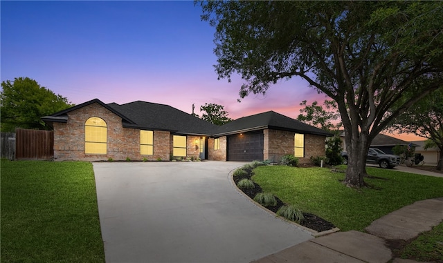 4530 Megal Dr, Corpus Christi, TX 78413 - ranch-style home with driveway, brick siding, a garage, and a shingled roof