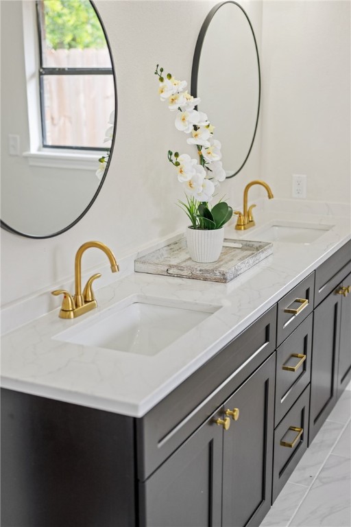 4530 Megal Dr, Corpus Christi, TX 78413 - full bath with double vanity and marble finish flooring