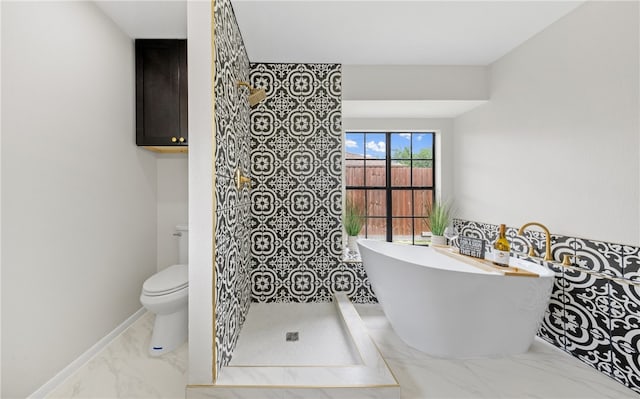 4530 Megal Dr, Corpus Christi, TX 78413 - full bathroom featuring marble finish flooring, a freestanding bath, and toilet