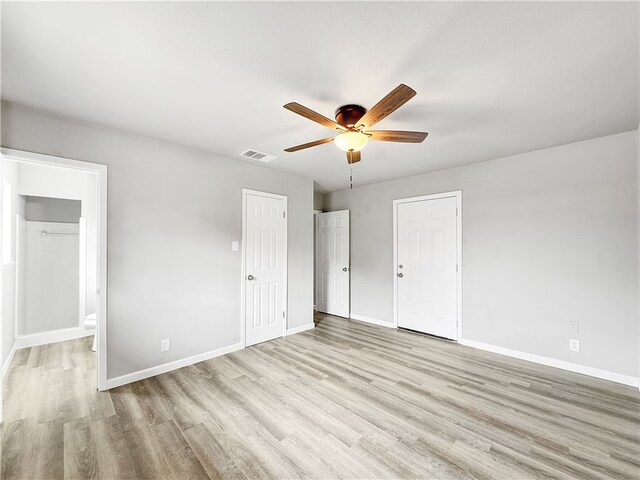 unfurnished living room with light hardwood / wood-style floors