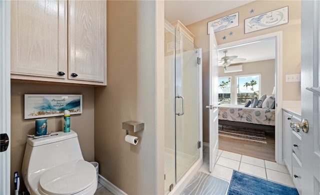 full bathroom featuring a stall shower, a wall mounted air conditioner, connected bathroom, and tile patterned floors