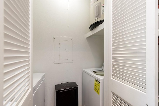 washroom with laundry area and electric panel