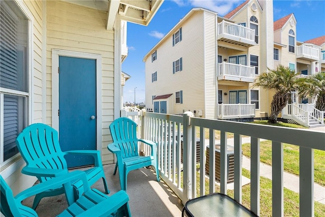 balcony featuring a residential view