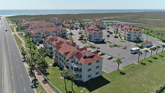 drone / aerial view with a water view