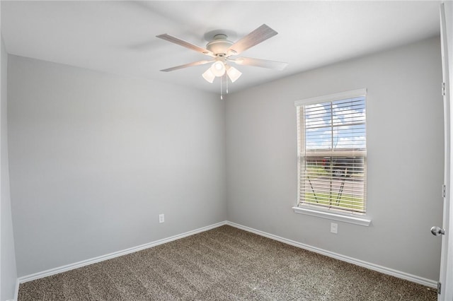 unfurnished room with carpet flooring and ceiling fan