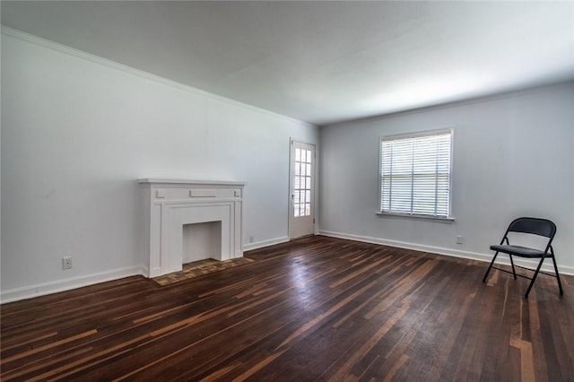 1522 Clodah Dr, Corpus Christi, TX 78404 - unfurnished living room with dark wood finished floors and crown molding