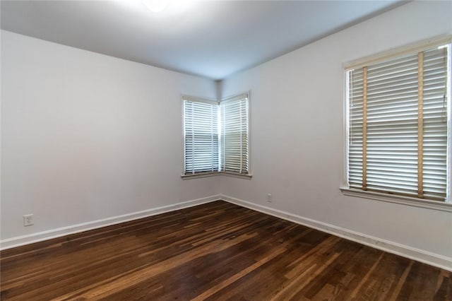 1522 Clodah Dr, Corpus Christi, TX 78404 - unfurnished room featuring baseboards and dark wood-style floors