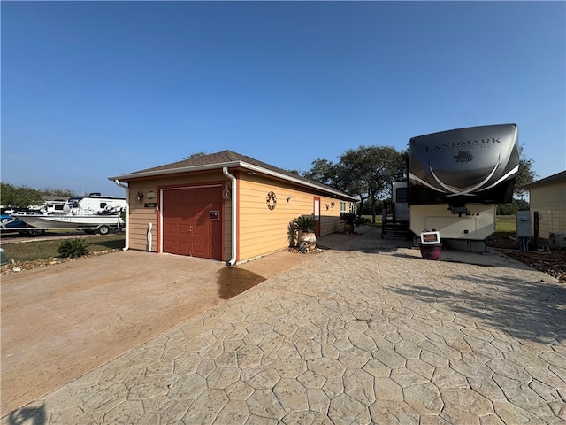 view of outdoor structure featuring a garage