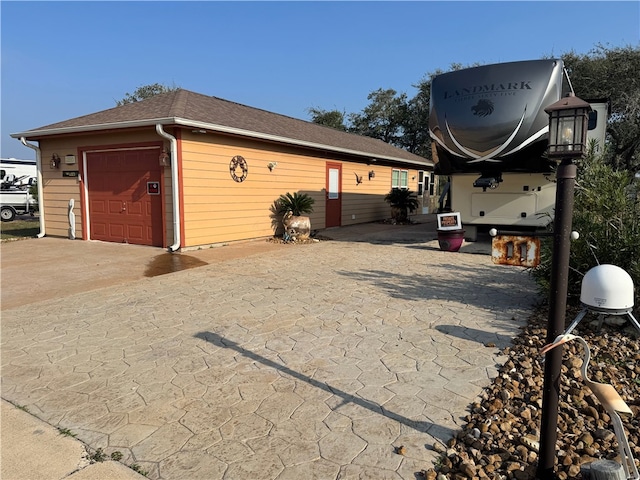 exterior space with a garage