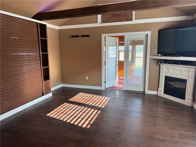 unfurnished living room with dark wood-type flooring and lofted ceiling with beams