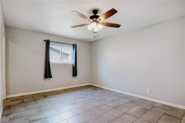 433 Pleiades Pl, Corpus Christi, TX 78418 - empty room featuring a ceiling fan, baseboards, and light tile patterned flooring