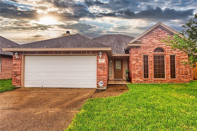 7014 Mona Lisa Cir, Corpus Christi, TX 78413 - view of front of home featuring brick siding, roof with shingles, and concrete driveway
