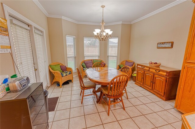 7014 Mona Lisa Cir, Corpus Christi, TX 78413 - dining room featuring light tile patterned floors, a chandelier, and crown molding