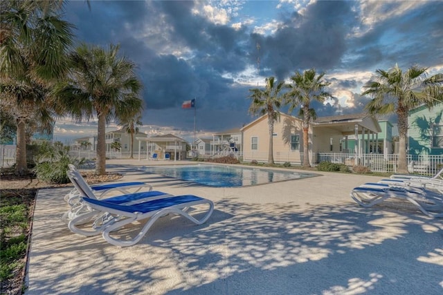 view of swimming pool with a patio area