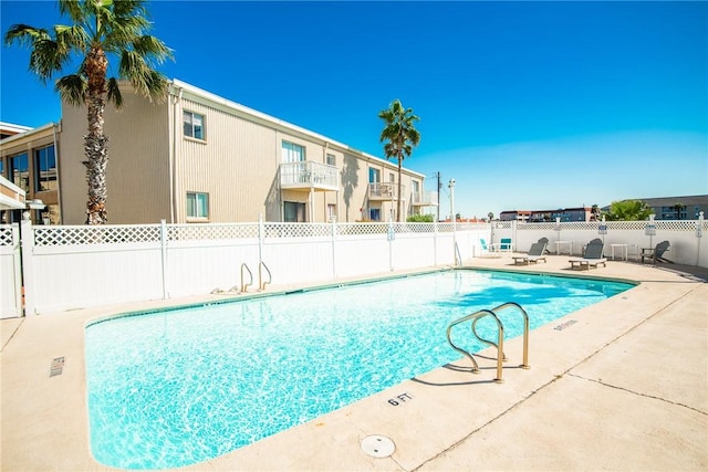 view of pool featuring a patio area