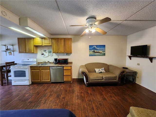 kitchen with electric range, dark hardwood / wood-style floors, stainless steel dishwasher, and sink