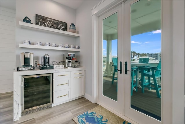 969 Banyan Beach Dr, Port Aransas, TX 78373 - indoor wet bar with beverage cooler and light wood finished floors