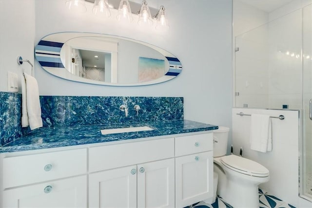 969 Banyan Beach Dr, Port Aransas, TX 78373 - full bath with vanity, a shower stall, and toilet