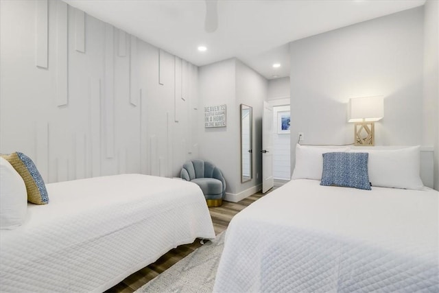 969 Banyan Beach Dr, Port Aransas, TX 78373 - bedroom featuring wood finished floors, recessed lighting, baseboards, and ceiling fan