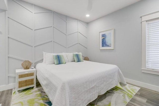 969 Banyan Beach Dr, Port Aransas, TX 78373 - bedroom featuring light wood-style flooring, baseboards, and recessed lighting