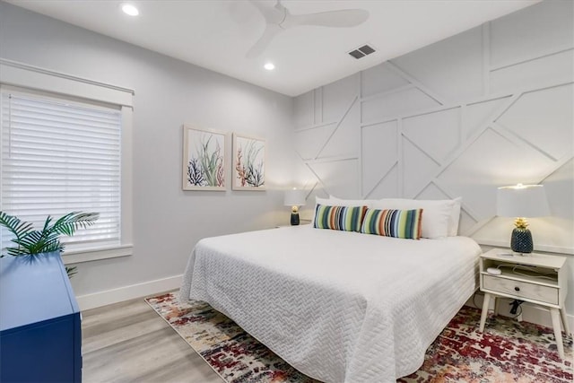 969 Banyan Beach Dr, Port Aransas, TX 78373 - bedroom with baseboards, wood finished floors, recessed lighting, and a ceiling fan