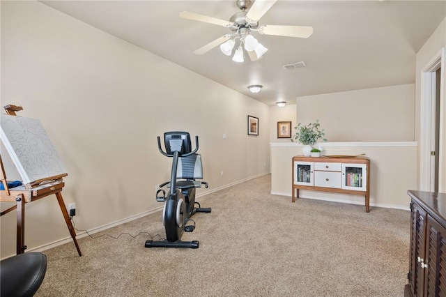 workout area featuring a ceiling fan, carpet flooring, visible vents, and baseboards