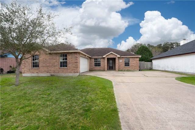 ranch-style home with brick siding, an attached garage, a front yard, fence, and driveway