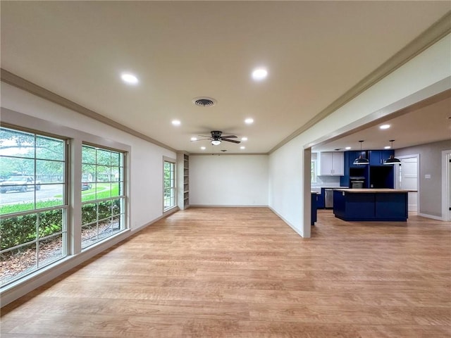 126 Rainbow Ln, Corpus Christi, TX 78411 - unfurnished living room with ceiling fan, ornamental molding, light wood finished floors, recessed lighting, and baseboards