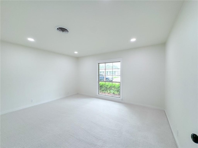 126 Rainbow Ln, Corpus Christi, TX 78411 - empty room with recessed lighting, light carpet, and baseboards