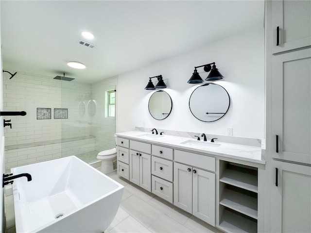 full bathroom with separate shower and tub, tile patterned floors, vanity, and toilet