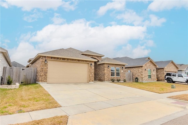 view of front of home with a garage and a front yard