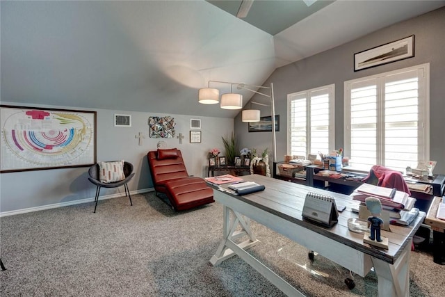 office featuring lofted ceiling, baseboards, visible vents, and carpet flooring