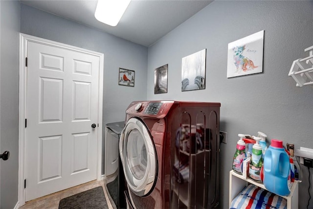 laundry area with laundry area and washing machine and dryer