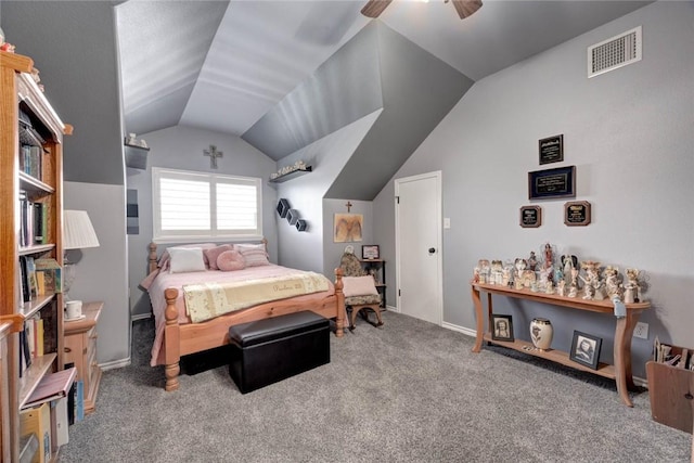 carpeted bedroom with vaulted ceiling and visible vents