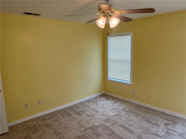 822 Indiana Ave, Corpus Christi, TX 78404 - carpeted empty room featuring visible vents, a ceiling fan, and baseboards