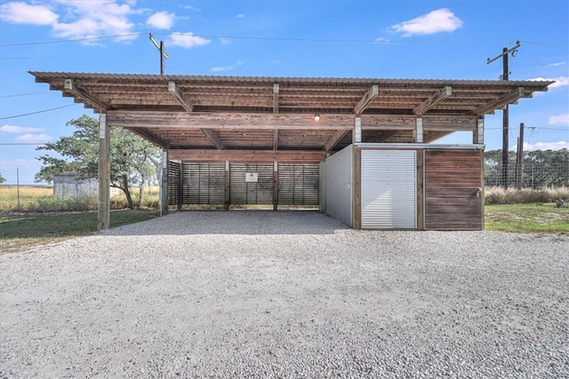 exterior space with a carport