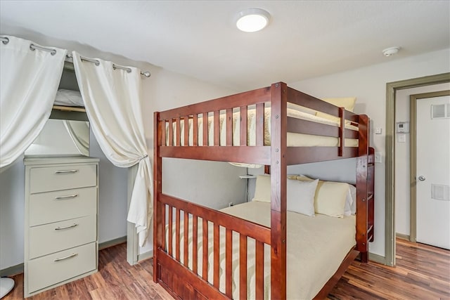 bedroom featuring dark hardwood / wood-style floors