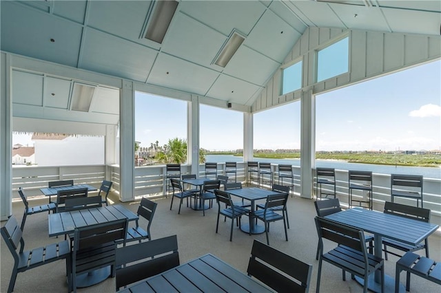 view of patio featuring outdoor dining space and a water view